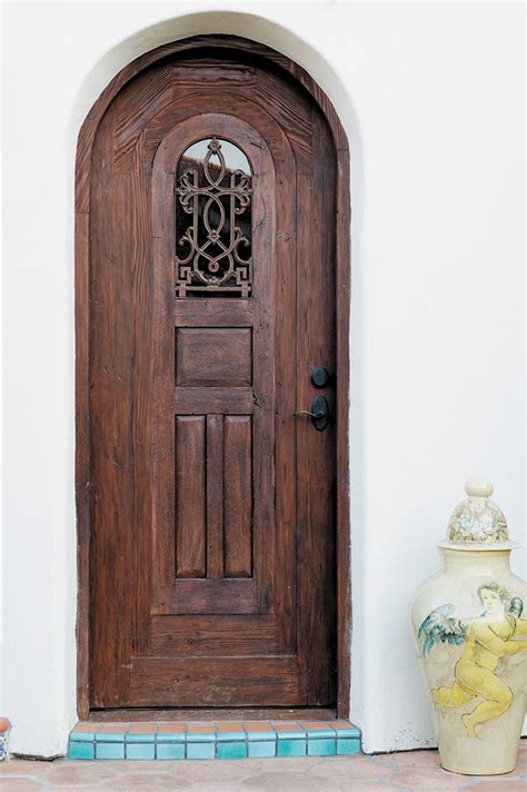 Grilled Peep Detail La Puerta Originals Arched Door With Grilled