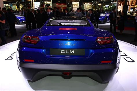 Japans Glm G4 Electric Four Door Supercar Wows Paris Auto Show Crowd