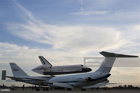 Space Shuttle Atlantis Riding Atop A Modified 747 Aircraft Taxis To