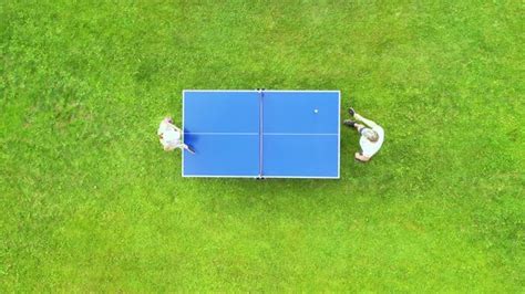 Aerial View People Playing Ping Pong Match Outdoor By Bigtunaonline