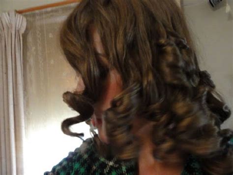 Divide your hair into sections. How to do Perfect Rag Curls - Women's Magazine By Women