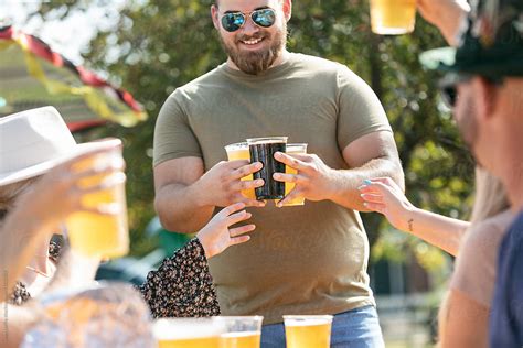 Beer Male Friend Brings Beers Del Colaborador De Stocksy Sean Locke Stocksy