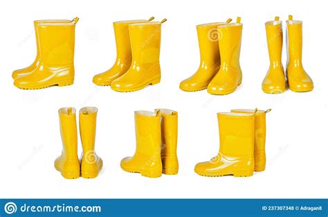 Set Of Yellow Rubber Boots Isolated On White Background Stock Photo