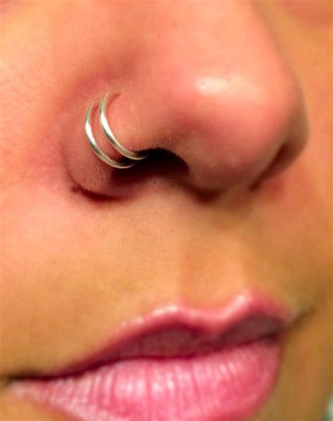 A Womans Nose With A Small Silver Ring On The End Of Her Nose