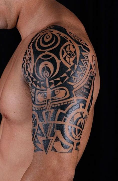 Tribal shoulder tattoos look great with their meandering curves and pointed angles. 69 Traditional Tribal Shoulder Tattoos