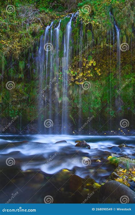 Vertical Long Exposure Shot Of The Mossbrae Falls In Dunsmuir Stock