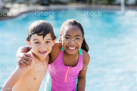 Boy And Girl Best Friends At Swimming Pool Stock Photo Download Image Now Istock