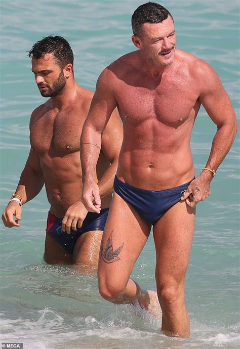 Luke Evans Shows Off His Very Ripped Physique With Mystery Man In Miami Daily Mail Online