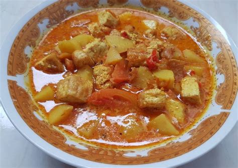 • 5 buah cabai rawit merah, diiris. Resep Tahu kentang Kuah Kuning oleh MarnhiSN - Cookpad