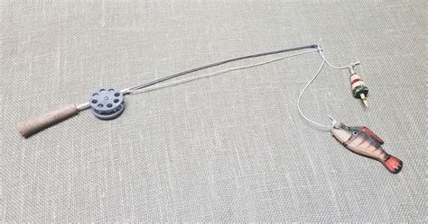 Fishing Pole Decor Silver Pole And Reel Bobber And Fish