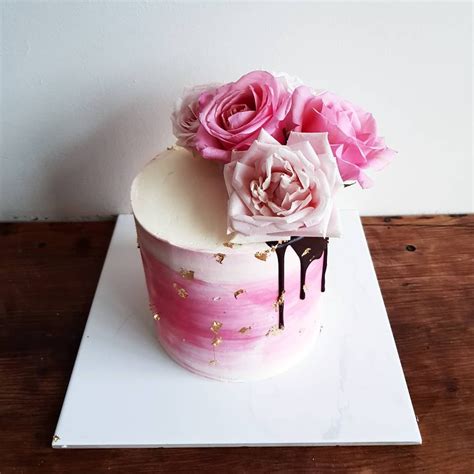 Pink Watercolor Buttercream Cake With Chocolate Drip And Pink Flowers