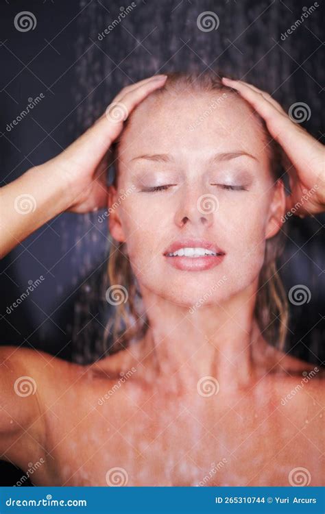Woman Under The Shower Against Dark Background Image Of A Woman Taking A Shower Against A Dark
