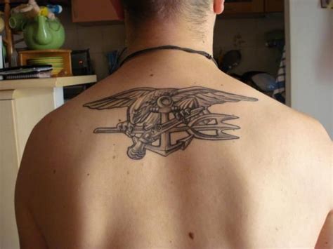 Navy tattoos give a very good and bold image of the tattoo bearers. Navy Seal Trident Tattoos | Trident tattoo, Tattoos, Seal ...