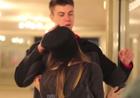 Girl Attempts To Kiss Strangers In Grand Central Station On Camera