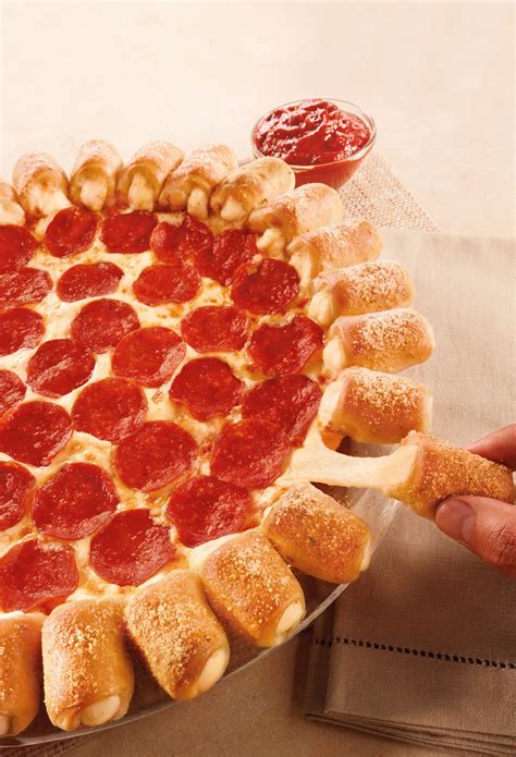 Cheesy Bites Pull Dip And Pop Their Way Back Into Pizza Hut