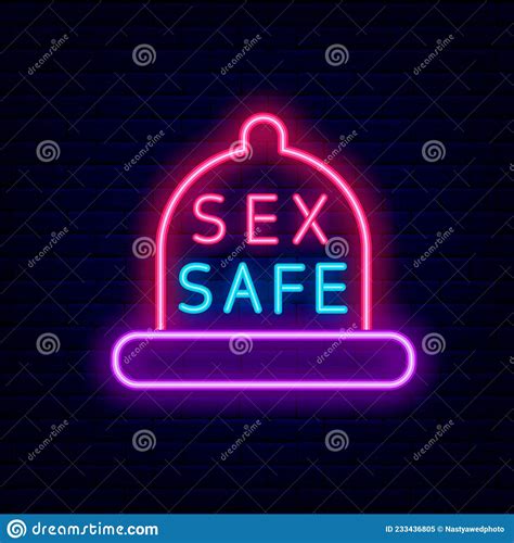 Sex Safe Neon Sign With Condom Frame On Brick Wall Background