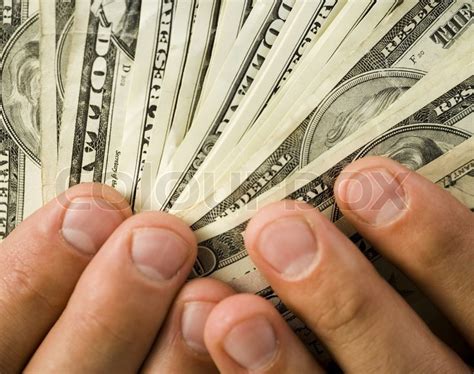 Close Up Of Hands Holding Money Dollars Stock Photo Colourbox