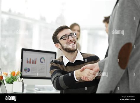 Handshake Manager And Client In The Office Stock Photo Alamy