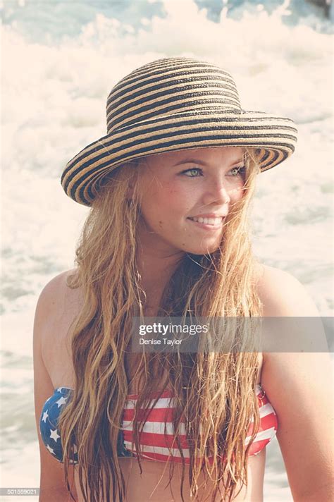 Young American Woman At The Beach Photo Getty Images