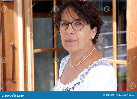 Portrait Of A Middle Aged Brunette Woman With Eyeglasses Stock Image