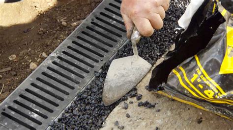 We had a new driveway added in november (boston area). How to Install a Channel Drain | Yard drainage, Drainage solutions, Backyard drainage
