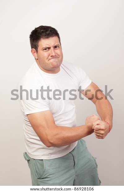 Man Flexing His Muscles Stock Photo 86928106 Shutterstock