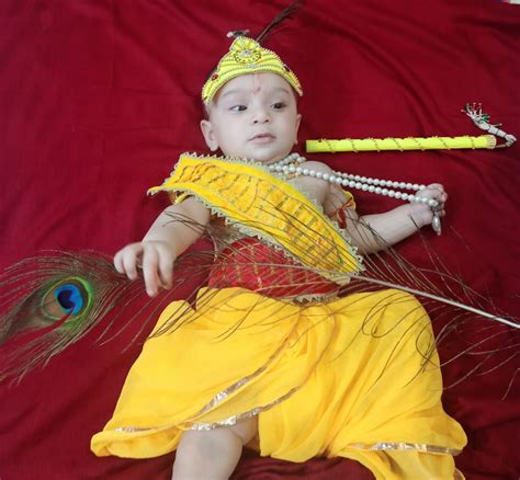 Krishna with mor pankh | Baby krishna, Krishna janmashtami, Krishna