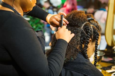 Why We Need To Start Training The Next Generation Of Afro Hair Stylists