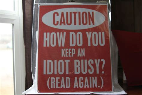 12 X 15 Tin Signs New Caution How Do You Keep An Idiot Busy Read