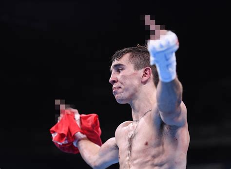 michael conlan of ireland reacts after losing on points during his bantamweight quarter final