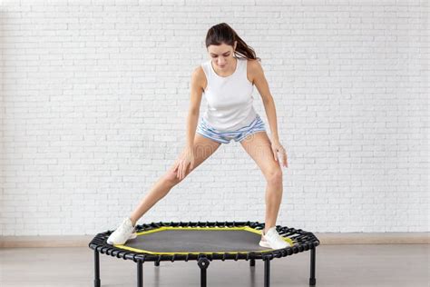 Relaxed Woman Jumping On Trampoline Stock Image Image Of Health