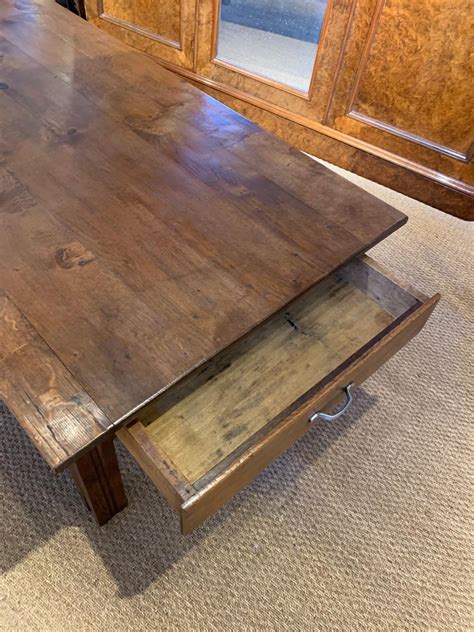 Pretty coffee table, solid oak with mahogany and oak marquetry, filled and waxed finishing, thick glass on top, france, circa 1940. Large Oak Coffee Table For Sale at 1stdibs