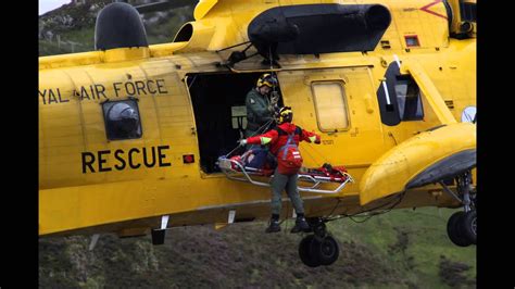 Mountain Rescue Helicopter Uplift Of Stretcher Youtube