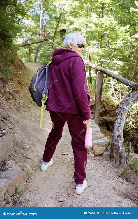 Senior Woman Hiking In Forest Trail Stock Photo Image Of Walking