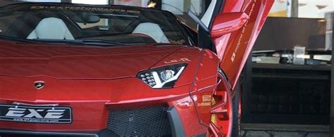 Liberty Walk Lamborghini Aventador Roadster Features Red Carbon