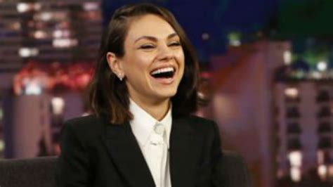 Mila Kunis Laughing