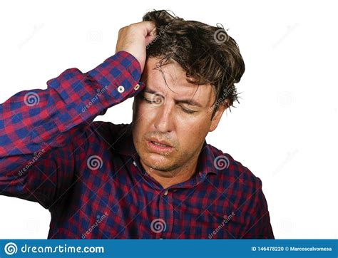 Stressed And Overwhelmed 30s Or 40s White Man Holding Head With Hands