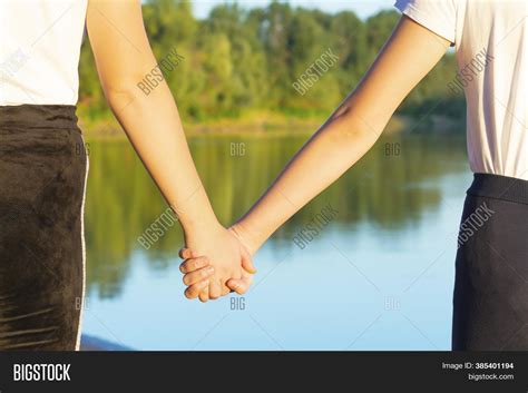 Two Babe Girls Best Friends Holding Hands