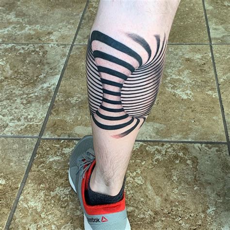 25 Optical Illusion Tattoos That Will Melt Your Brain