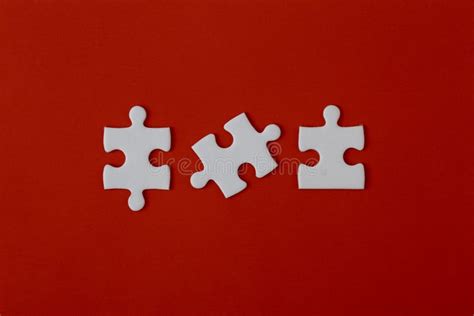 White Puzzle Pieces On A Red Background Stock Photo Image Of Isolated