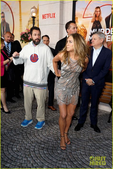 jennifer aniston hilariously calls out adam sandler for wearing a sweatshirt at murder mystery