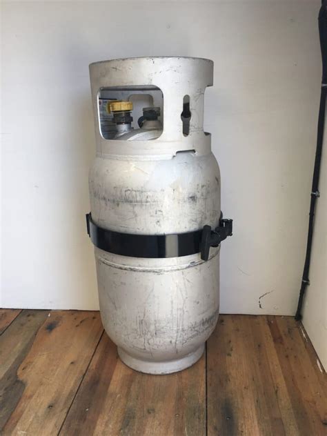 Light duty, 1/2 ton and 3/4 ton pickup trucks; Propane Tank Holder $156.00 - Super Lawn Trucks