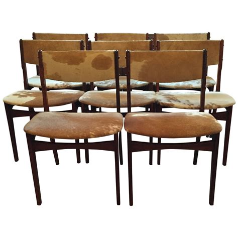 Set Of Eight Danish Rosewood Dining Chairs Dressed In Cowhide