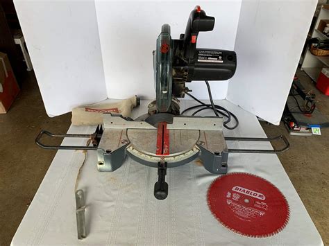 Lot 130 Craftsman 10 Inch Compound Miter Saw With Ryobi Bag And