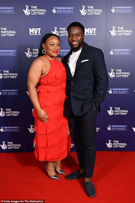 babatunde aleshe of i m a celebrity with wife leonie at the national lottery s big bash