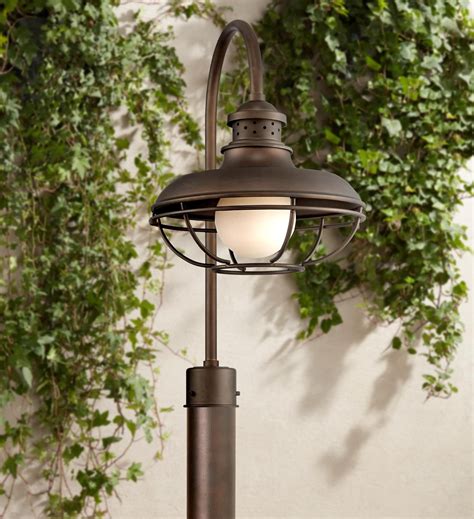 Light posts are very practical option as they hold the light up high and light 360 degrees. Franklin Park 23 1/2" High Bronze Cage Outdoor Post Light - #3W037 | Lamps Plus | Outdoor post ...