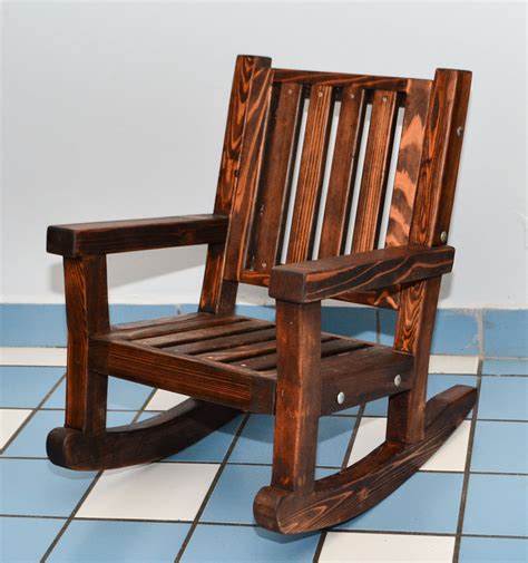 The wooden child seat is comfortable, strong, durable and safe. Kids Wooden Rocking Chair, Sturdy Redwood Kids Chair