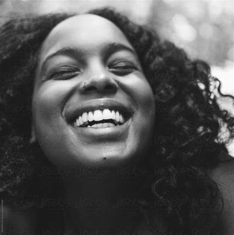 African American Woman Laughing By Stocksy Contributor Zoa Photo Stocksy