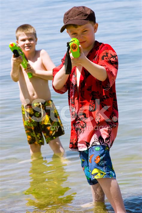Who Wants A Water Fight Stock Photo Royalty Free Freeimages