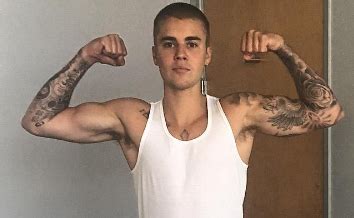 The sorry singer dons suits and ties for a sharply tailored office look. Photos: Justin Bieber Flexes Muscles in Instagram Photoshoot | BlackSportsOnline